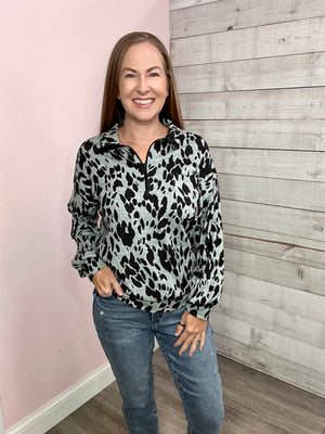 "Competitive Edge" Animal Print Half Zip Top